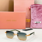 Sunglasses with blue-tinted lenses and gold metal frame and temples