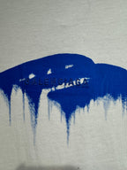 White Balenciaga T-shirt with blue drip graphic and BALENCIAGA text