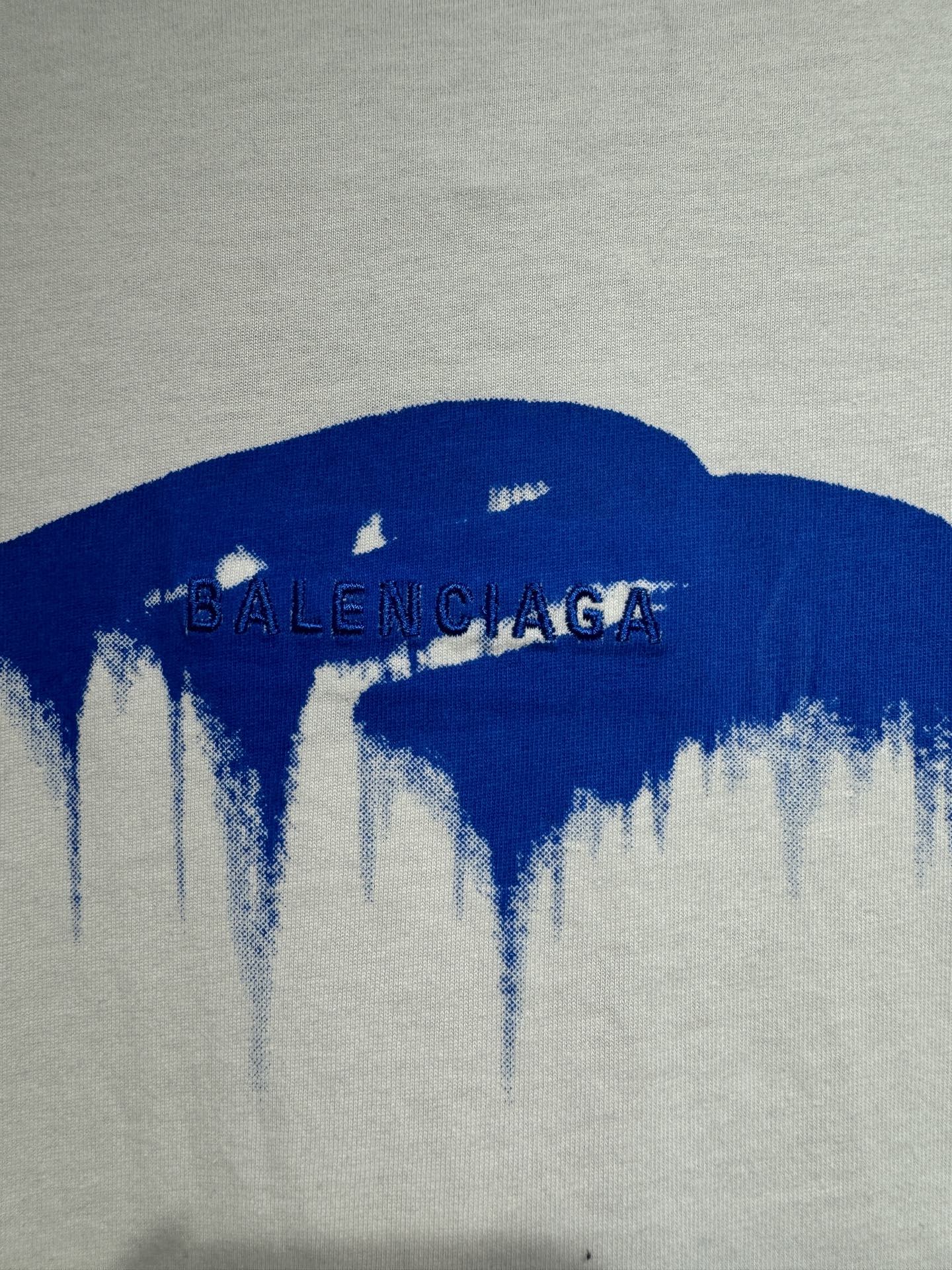 White Balenciaga T-shirt with blue drip graphic and BALENCIAGA text