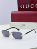 Gucci sunglasses with blue mirrored lenses, black frame, gold-tone bridge