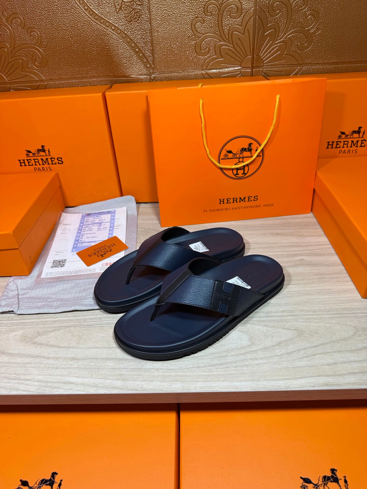 Hermes dark blue leather flip-flop sandals, pair with wide top strap