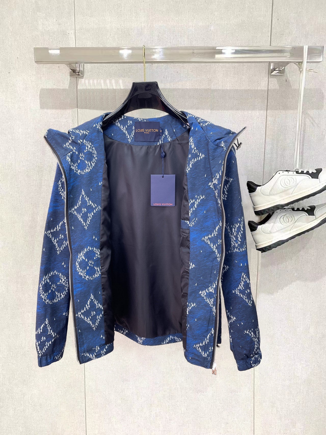 Blue hooded zip jacket with visible inner lining and back view
