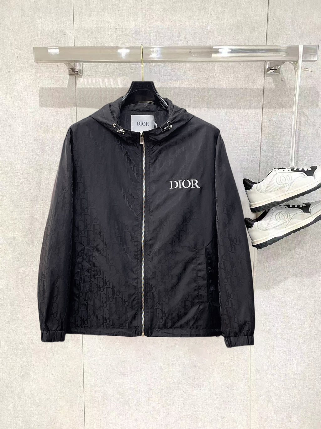 Dior hooded jacket, dark with front zipper and DIOR logo on chest