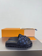 Louis Vuitton monogram slide sandals in dark navy with blue logo print