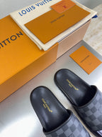 Louis Vuitton slide sandals, dark leather with check-pattern upper and branded detail