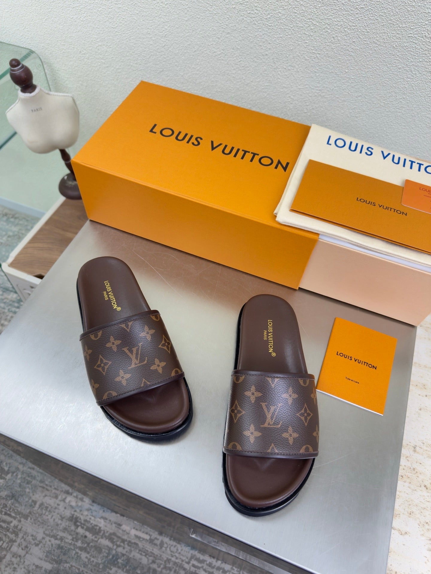 Louis Vuitton monogram slide sandals with dark brown footbed and thick sole