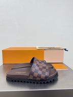 Louis Vuitton damier check slide sandals in brown, thick tread sole and padded footbed.