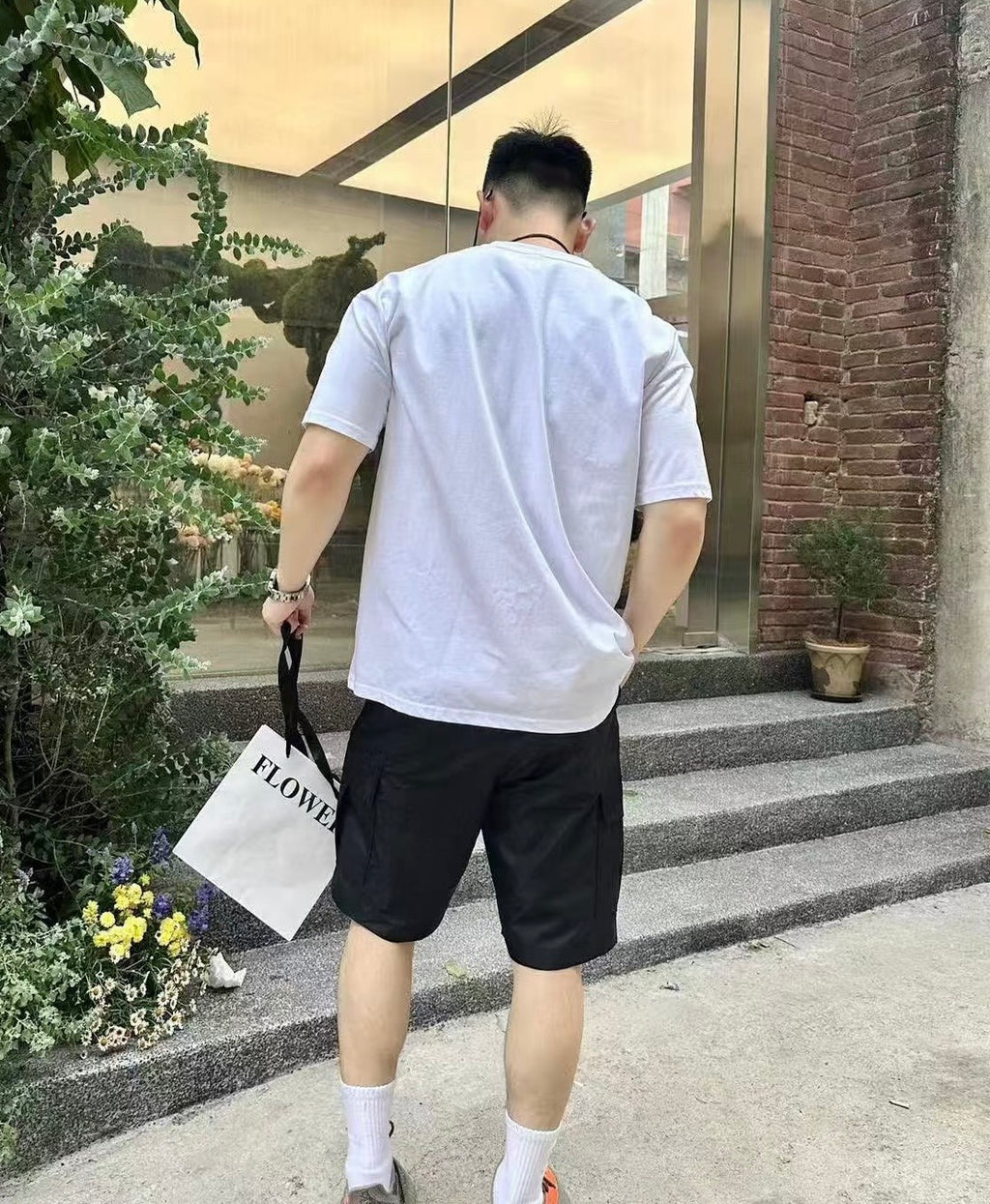 Prada black cargo shorts back view with side pockets