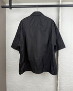Prada short jacket back view with relaxed short sleeves and shoulder shaping