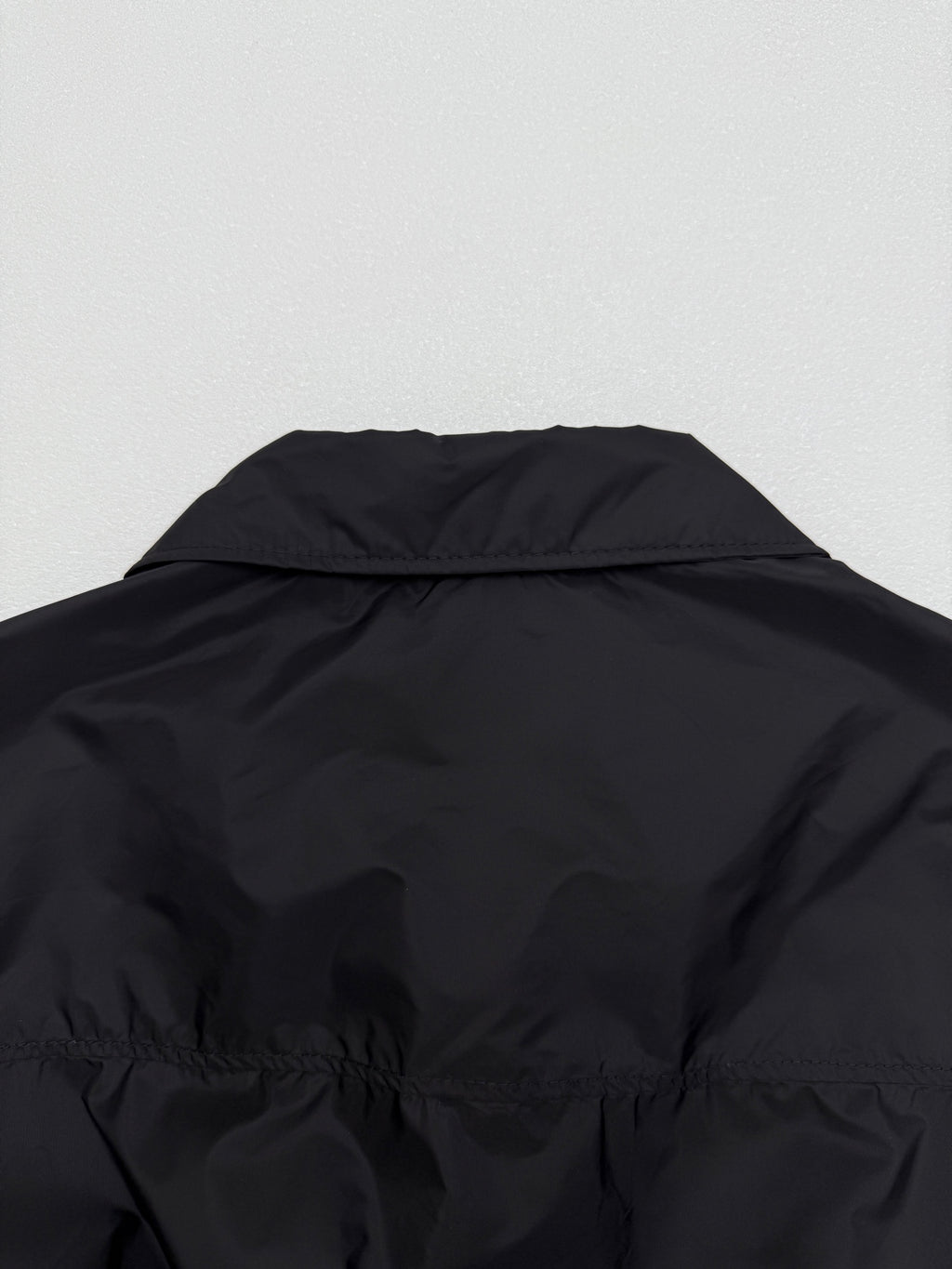 Prada short jacket back upper yoke with curved collar and shoulder gathers