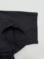 Prada short jacket side panel with hidden pocket opening at the seam