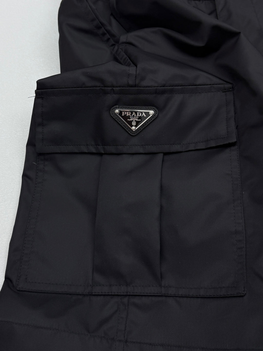 Prada black cargo shorts back panel with Prada logo patch