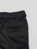 Prada black cargo shorts close-up of elastic waistband and stitching