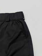 Prada black cargo shorts with elastic waistband and angled side seam