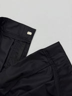 Prada black cargo shorts hem detail with side pocket stitching