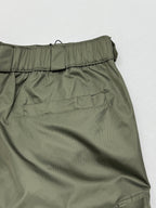Olive cargo shorts with elastic waistband and stitched back seam