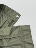 Olive cargo shorts with side zip pocket and reinforced cargo panel