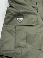 Olive cargo shorts with PRADA logo patch on front cargo pocket