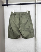 Olive cargo shorts with elastic waistband and cargo pocket detail