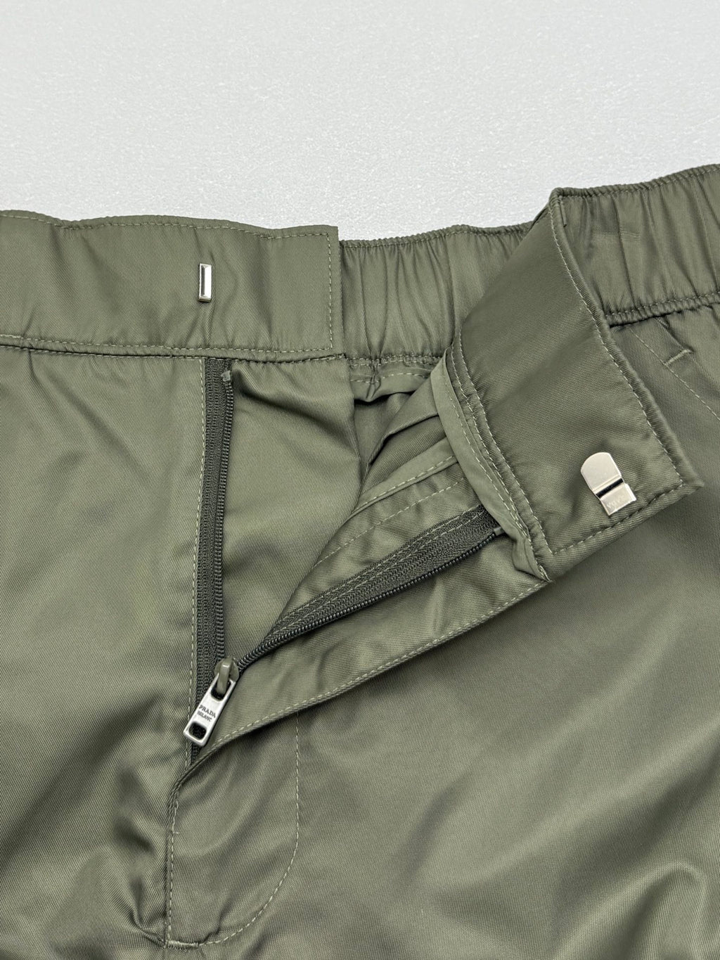 Olive cargo shorts front fly with zip and overlapping panel