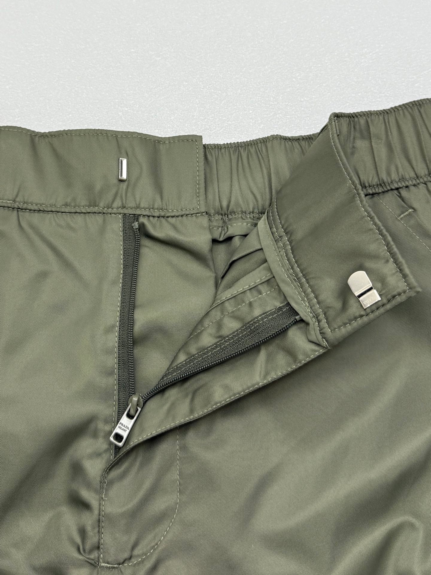 Olive cargo shorts front fly with zip and overlapping panel
