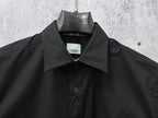 Short-sleeve button-up shirt, dark black, pointed collar with inner Burberry label