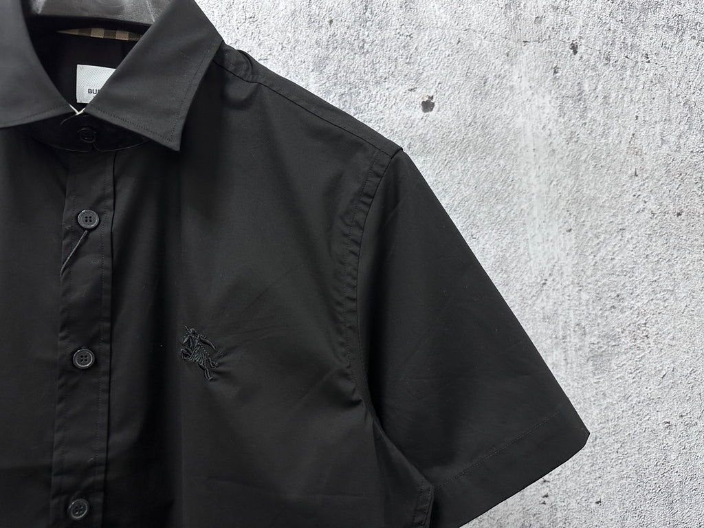 Black short-sleeve button-up shirt with logo embroidery and button placket