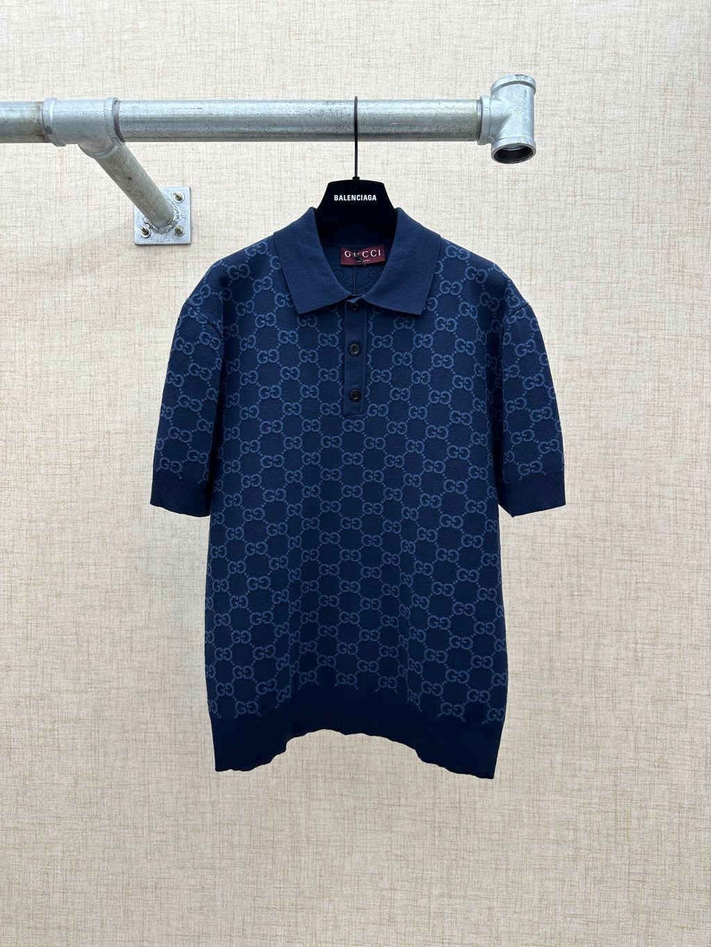 Dark navy polo shirt with GG monogram pattern, button placket, short sleeves