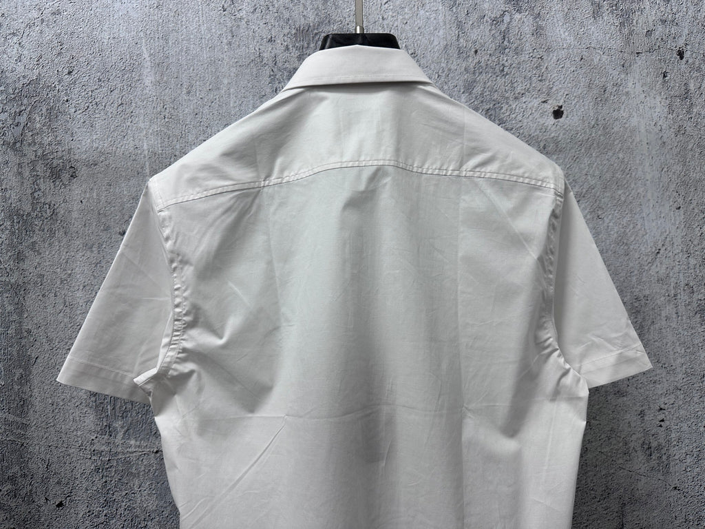 White short-sleeve button-up shirt back view with center seams