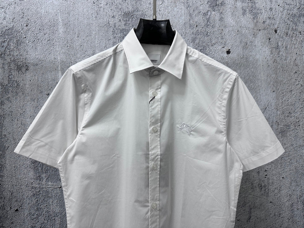 White short-sleeve button-up shirt front view with buttoned center placket