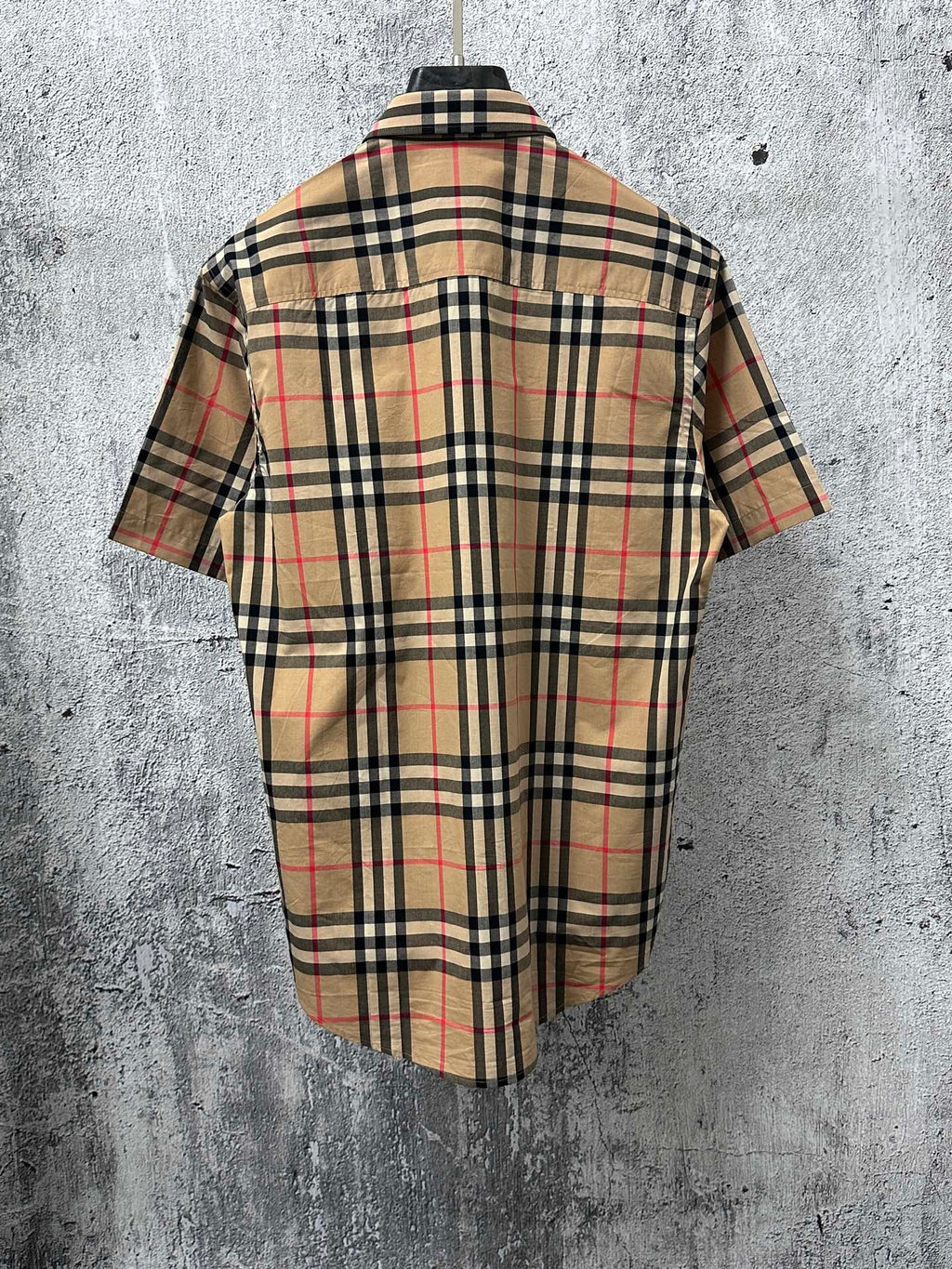 Burberry plaid short-sleeve button-up shirt, back view with point collar