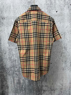 Burberry short-sleeve button-up shirt, plaid back view with center placket