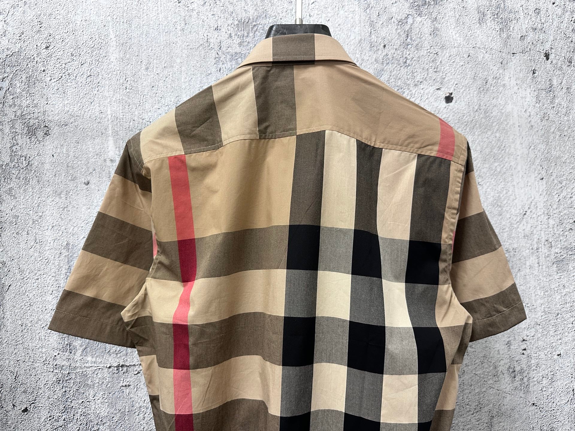 Back view shirt with short sleeves, beige, black, and red plaid