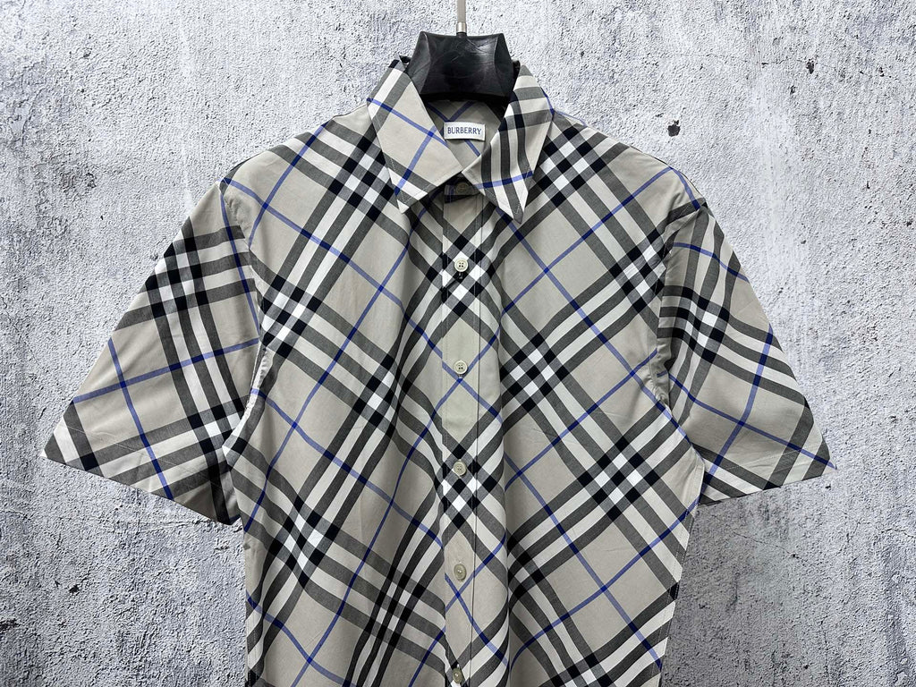 Burberry plaid short-sleeve button-up shirt, front view with collar and placket