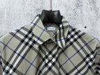 Burberry plaid short-sleeve button-up shirt close-up of collar and front buttons