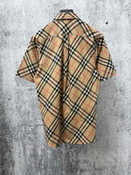 Short-sleeve plaid button-up shirt, beige with black and red, back view