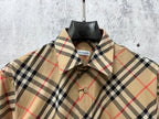 Burberry short-sleeve plaid shirt neckline with button placket detail