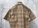 Plaid short-sleeve shirt back view with yoke and shoulder seams
