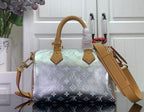 Louis Vuitton top-handle handbag with silver monogram canvas and tan leather wrist strap