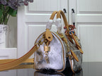 Louis Vuitton mini handbag, silver monogram with tan handles and crossbody strap