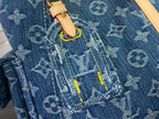 Denim monogram fabric pocket with tan tab and multicolor contrast stitching