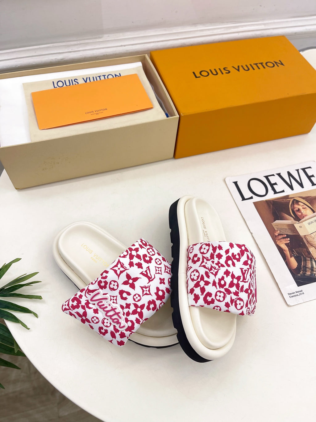 Louis Vuitton sandals, white with red monogram print on the wide slide straps