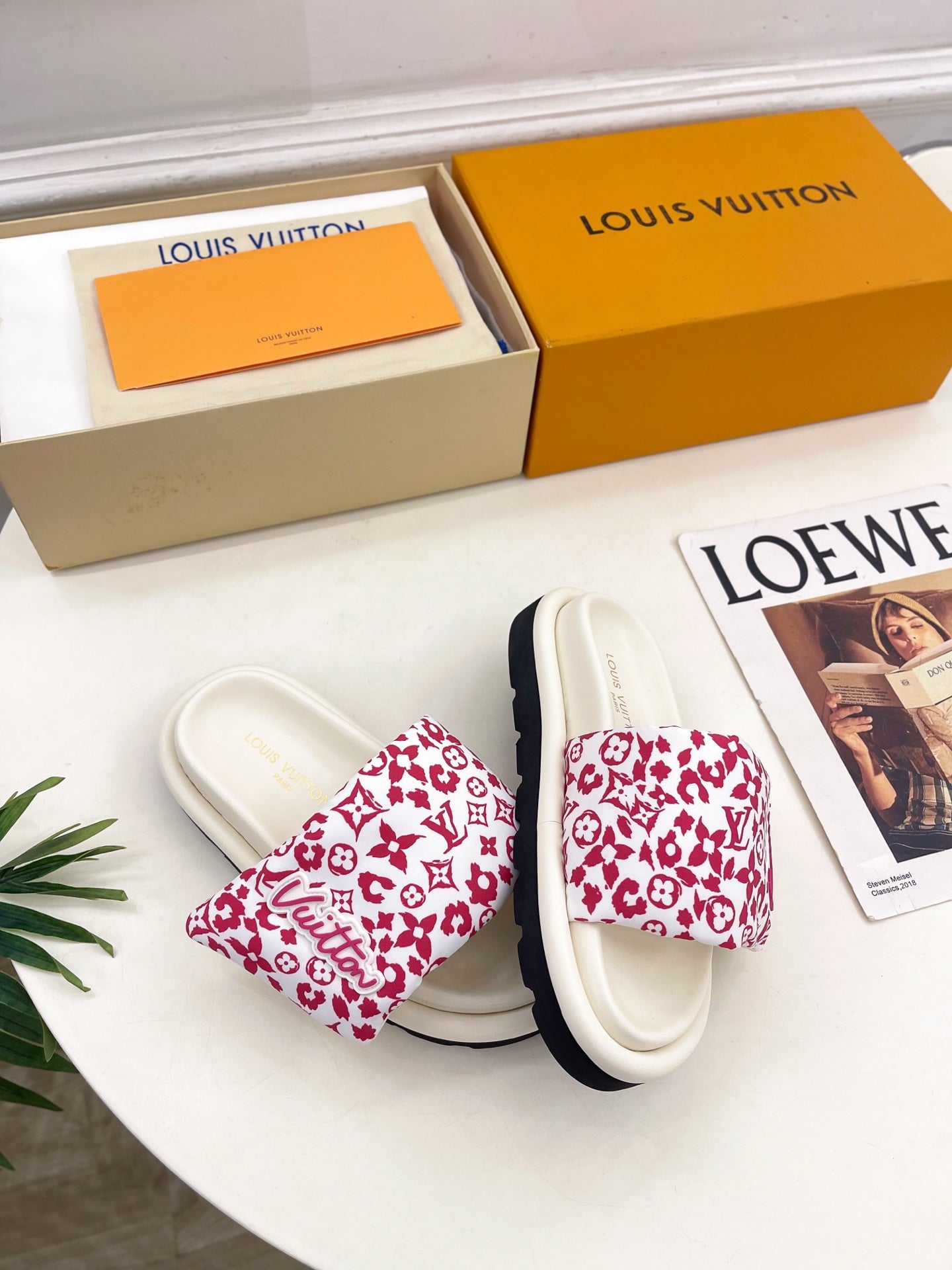 Louis Vuitton sandals, white with red monogram print on the wide slide straps