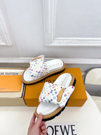 Logo slide sandals, white strap with multicolor monogram pattern and tan outsole