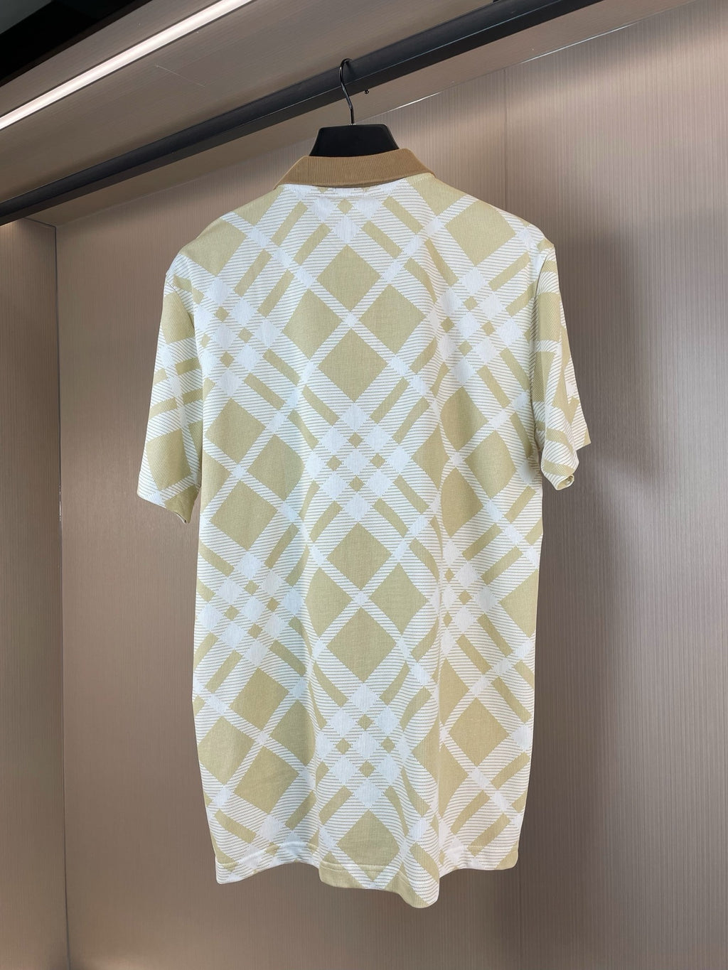 Short-sleeve polo shirt back view with yellow-and-white lattice check pattern