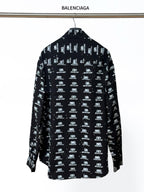 Black long-sleeve button-up shirt with Balenciaga logo repeat, back view.