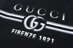 Black short-sleeve T-shirt with Gucci "Firenze 1921" logo graphic close-up