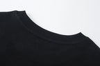 Black crew-neck T-shirt with ribbed collar trim