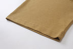 Tan T-shirt hem and stitched cuff detail
