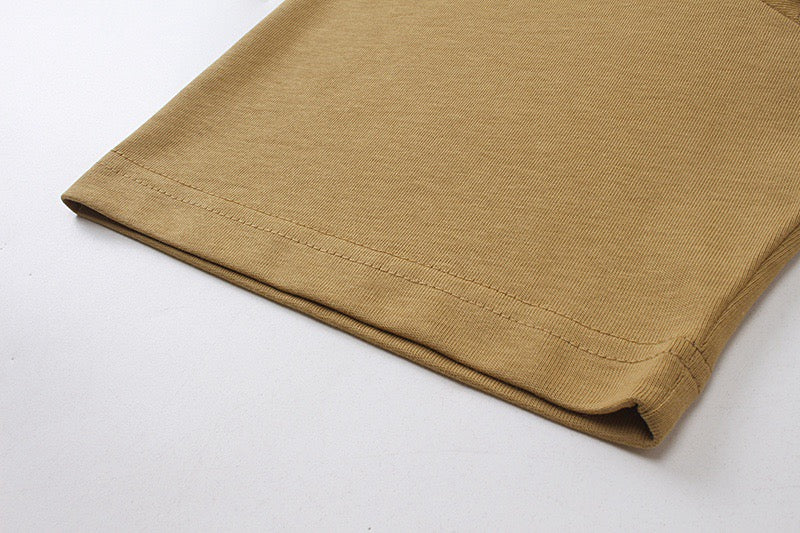 Tan T-shirt hem and stitched cuff detail